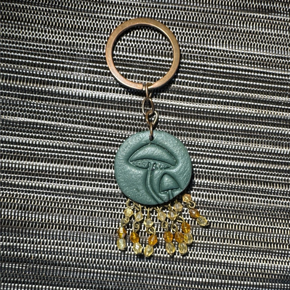 Elegant Green Keychain with Beaded Accents